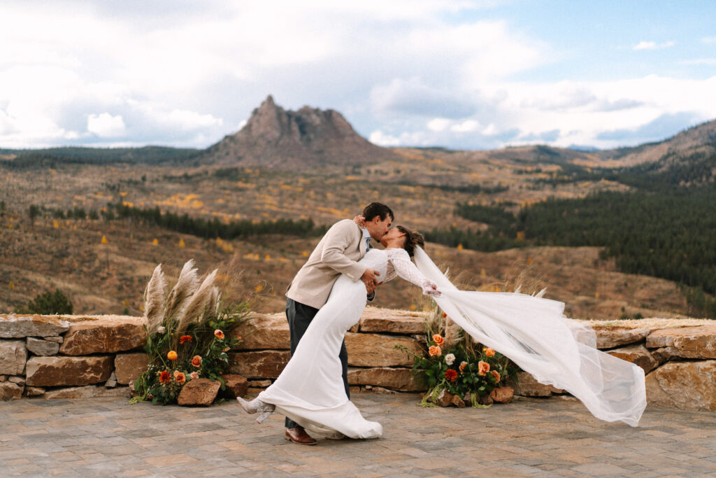 Bride and Groom Kiss at Alter