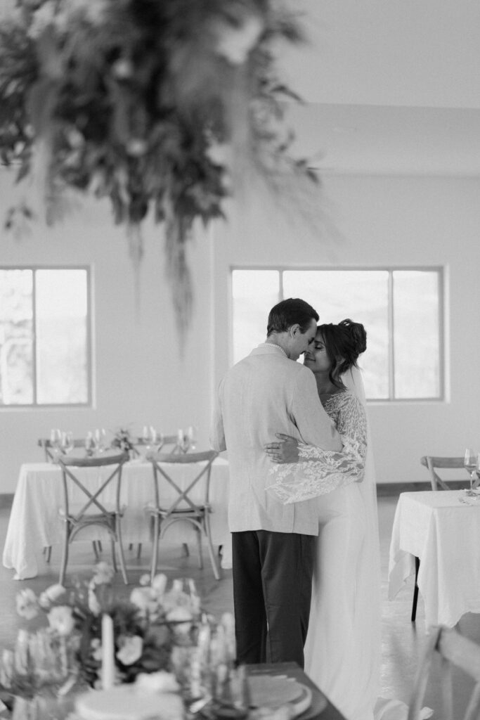 bride and groom share a moment during reception